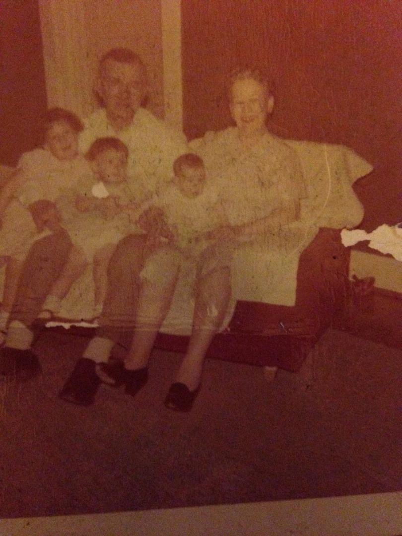 That's Debbie,Regina,and me with our Grandma and Grandpa Morris I am setting on my Grandma's lap