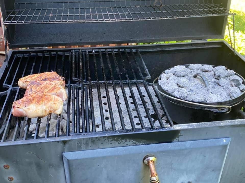 Tonight’s supper. Dutch oven, spare ribs, grilled cauliflower and strawberries with whipped cream.