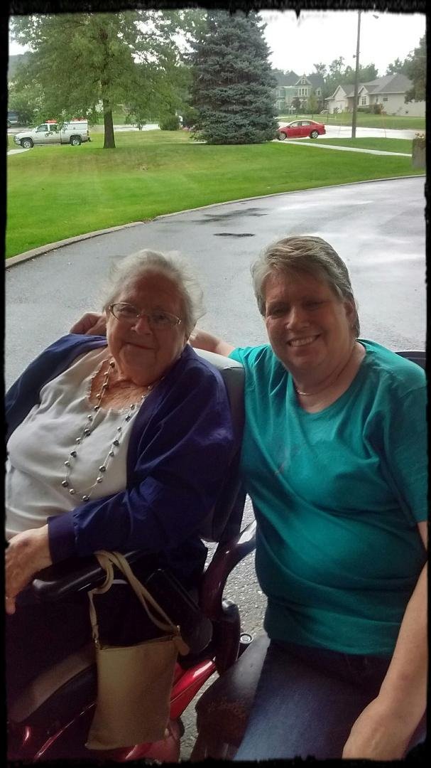 Spending a memorial day with my aunt Dottie. Listing and singing along with the music being played. (Singing in the rain).