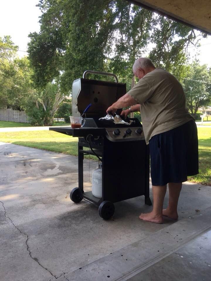Daddy cooking our ribs!