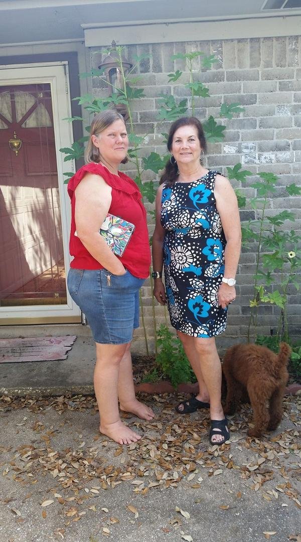 Cousin Lisa Franklin and B Davine Moore Roberts in Houston, TX. We are standing in front of her okra plants which have okra growing on them. We had a great time sharing our genealogy stories.
