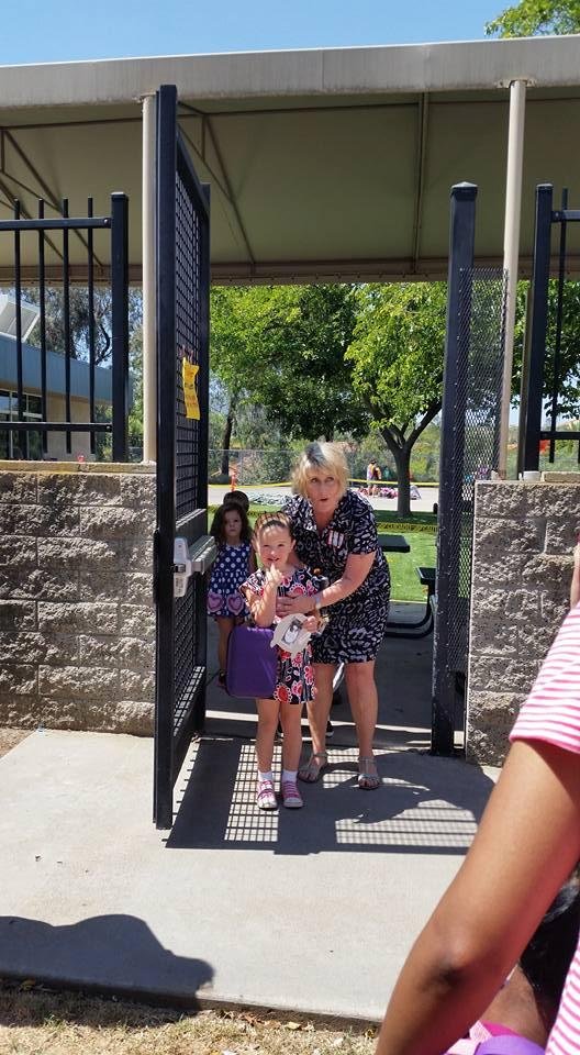 Camryn looking for us before her teacher will release her. She had a great first day of school.