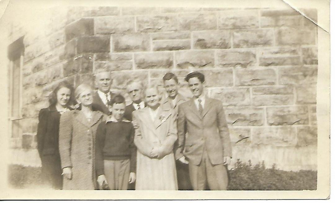 This is Redmonds and Floyds at Vulcan Feb 18, 1945.  Names on back - Marilyn, Clarence, Glyde, Wayne, Minnie, Robert and John William.