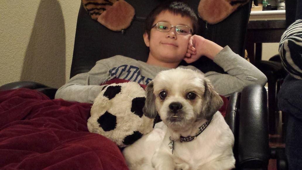 Our son Ethan with Scooby Doo our dog.