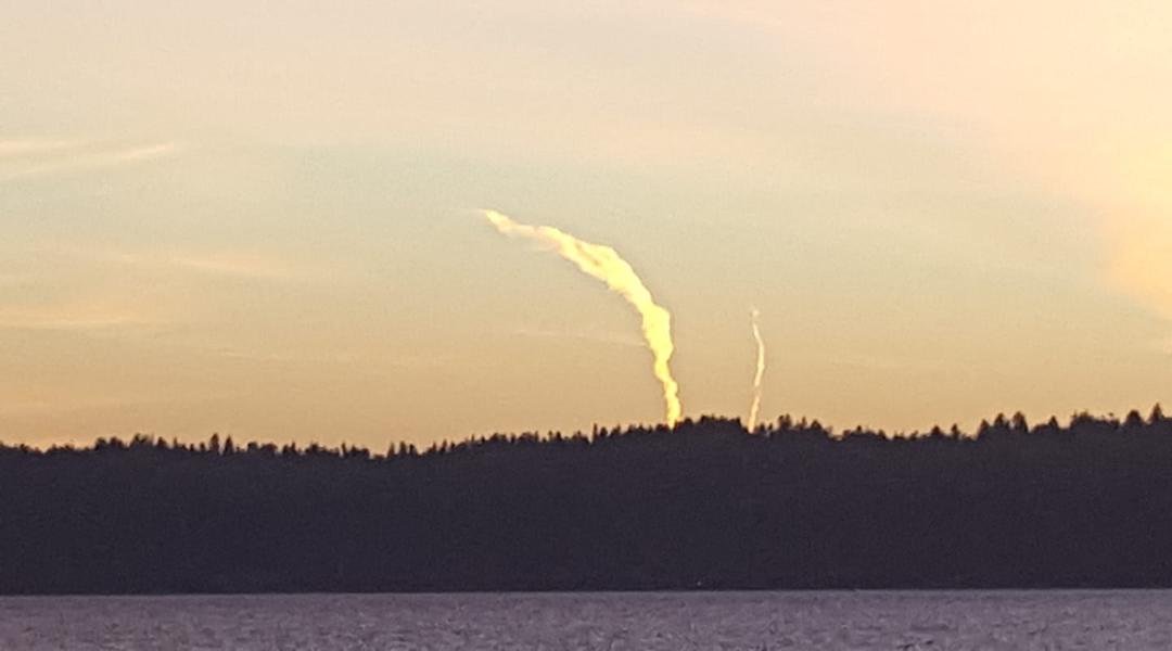 Fauntleroy ferry dock watching vapor trails headed skyward.