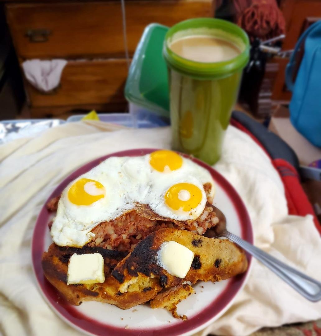 A rehash of yesterday's brekky, except hold the home fries, eggs sunny side up on the hash, soda bread grilled, and washing it down with a tall Demon Roast from Prime Roast Coffee Company . 😋