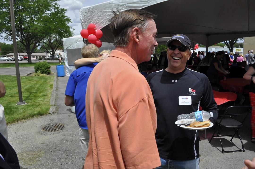 KTVB Anchor Mark Johnson and former reporter Jake Putnam talk old times at the Ch. 7 reunion picnic.