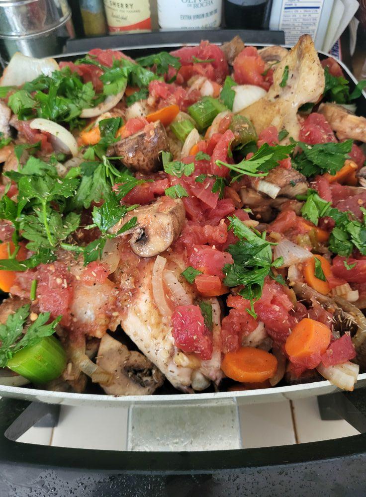 Here's one of my roosters, who went to Freezer Camp last week, making an appearance as Chicken Cacciatore! Extra points if you can spot the tail!
