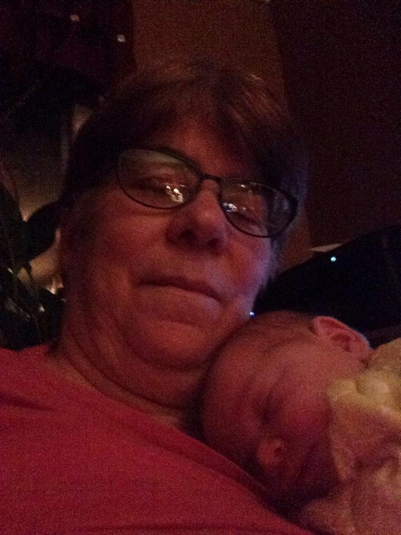There's something about sitting in a rocker watching it sleet and cuddling with our peanut!