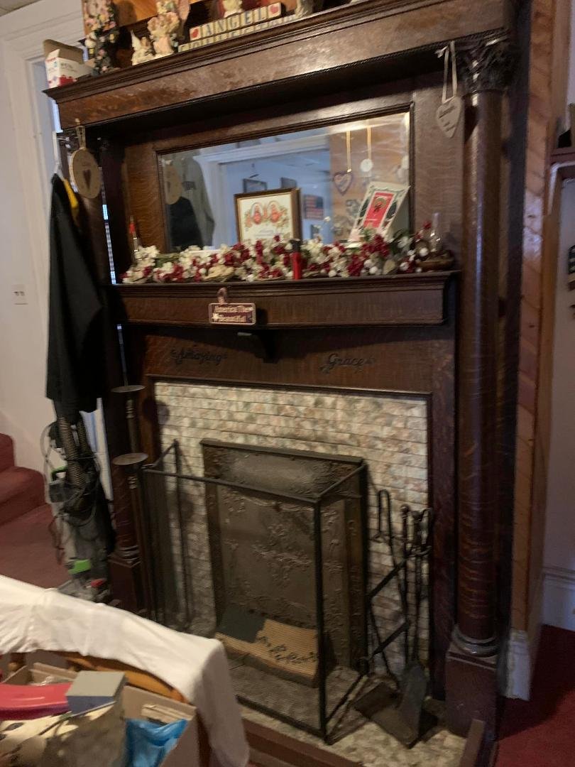 Original fireplace and mantle… the current occupants were kind enough to let us in to take a look around