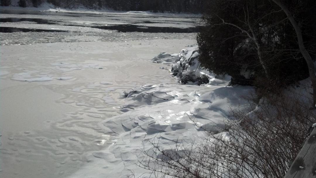 Ice on the river looking out from deck