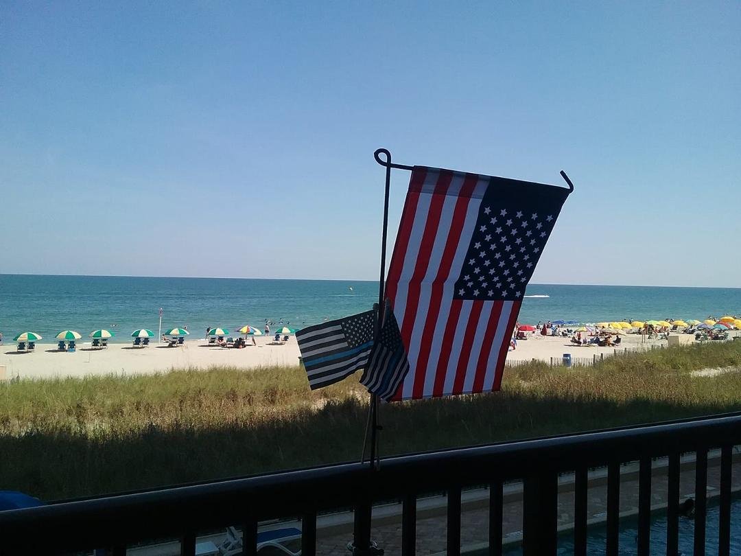 Decided to show my patriotism. Of course this pic is from the back. To people on the ocean side, the union is displayed correctly, with a little touch to support our heroes in blue!