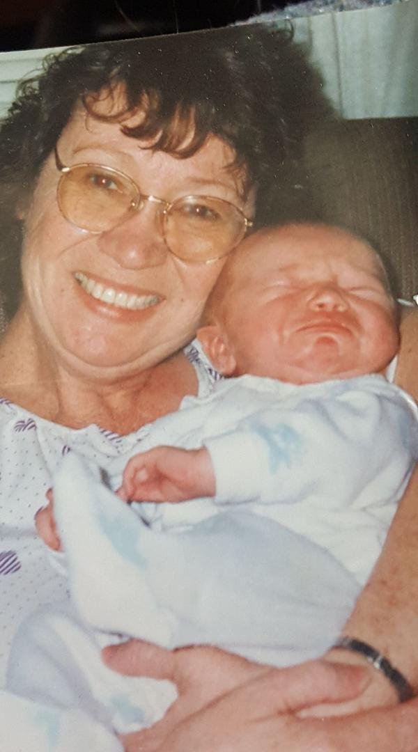This is one of my favorite baby pictures of my daughter This is my mom holding her first grandchild.