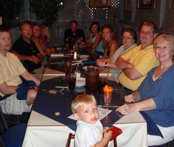 My Nephews son Nathan at the head of the table w/Joel my nephew to his left and sis-in-law, Brother and Great Grandmother (My MOM) to his right