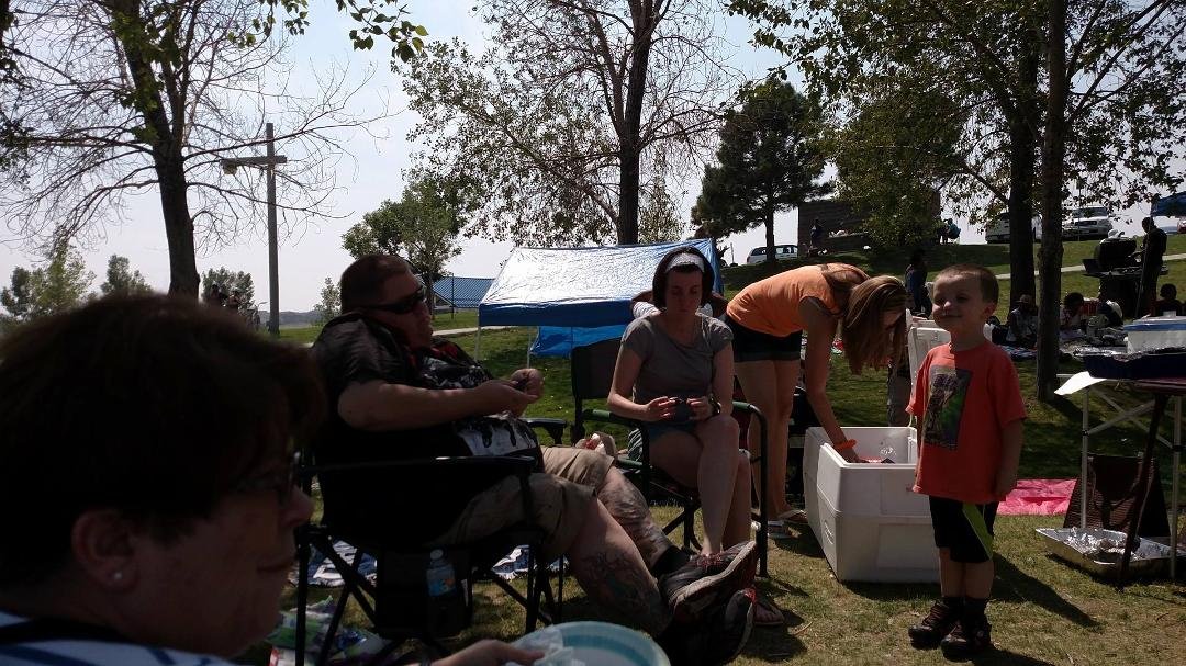 Photos of team members at a Picnic at Aurora Reservoir