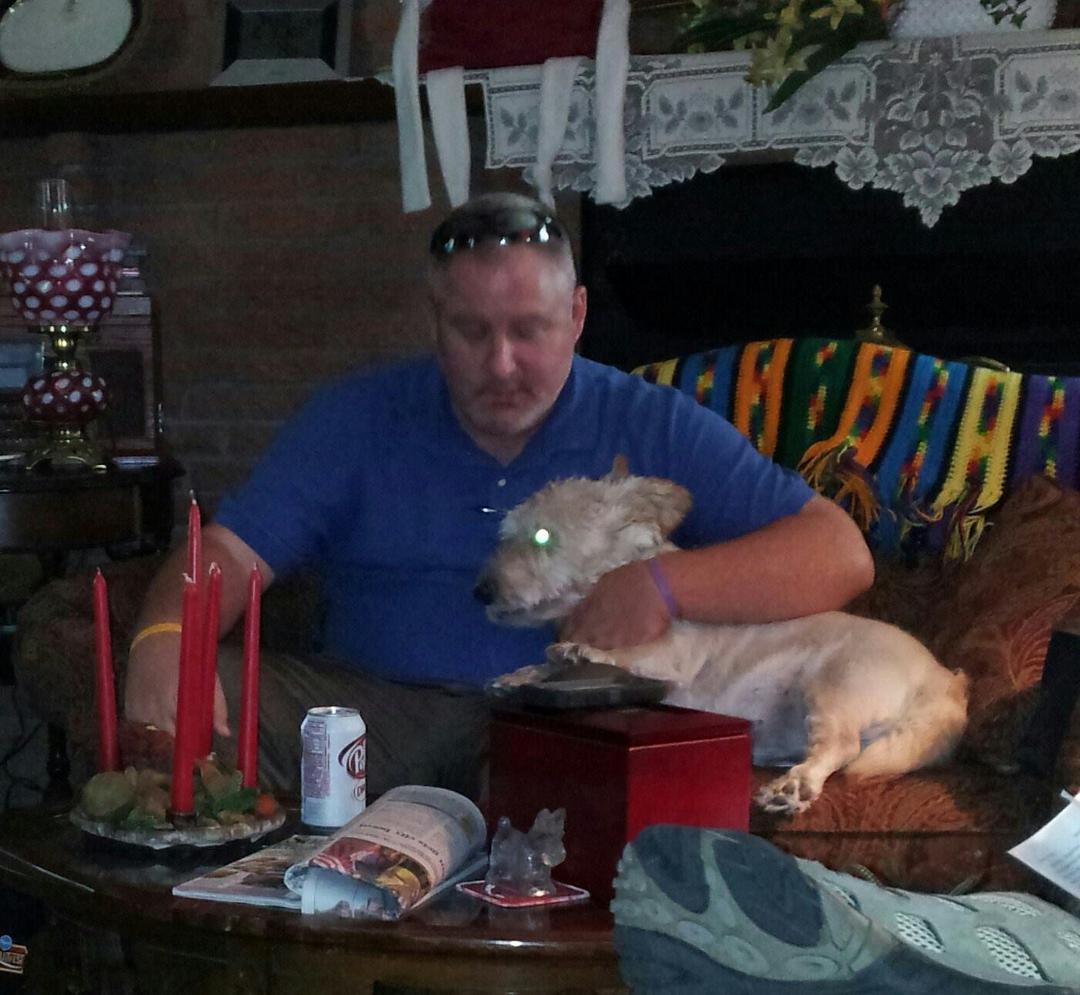 Sam and Joe III.  When Joe comes in and sits down Sam is in his lap waiting for some attention!!!