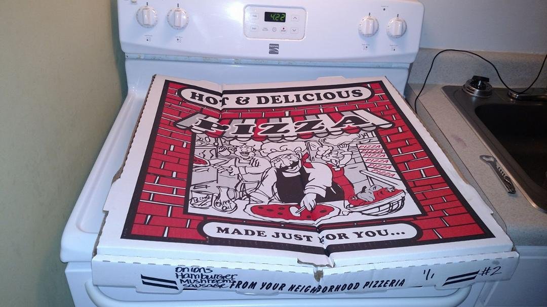 Well we were on the beach all day, so we decided to have pizza delivered This is what we got It is big as the stove All we ate was one piece