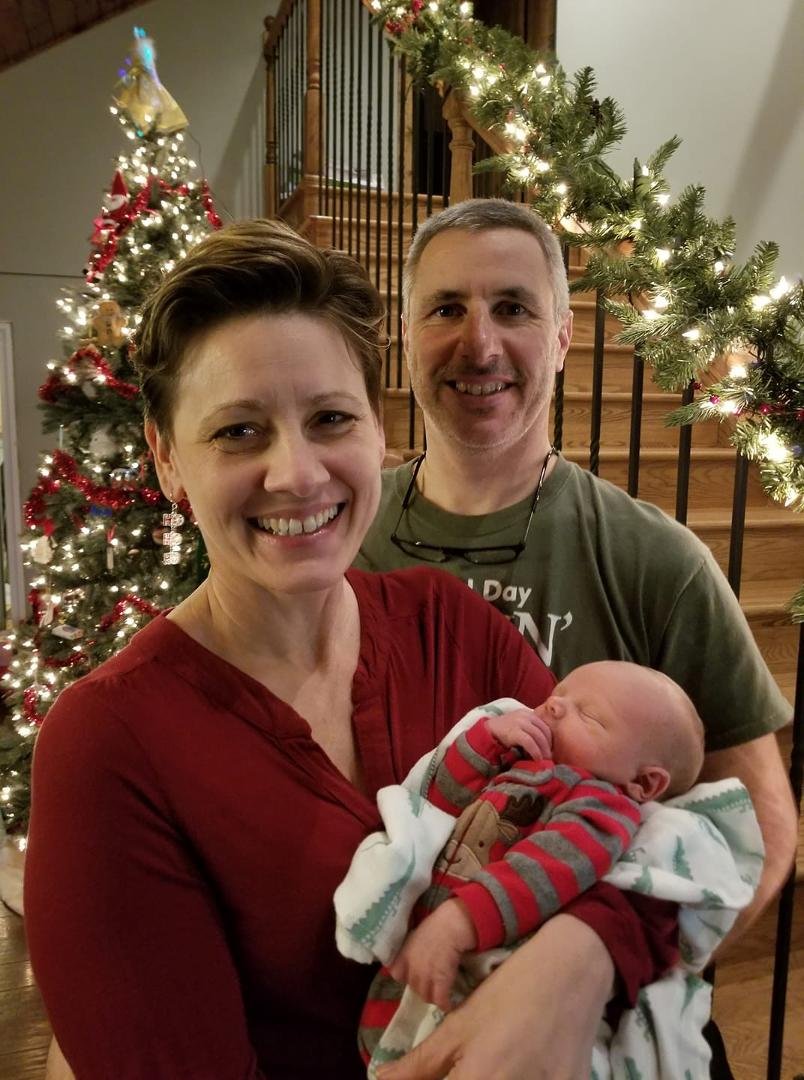 Grandma, grandpa and the new addition for his first (Green) Christmas Eve.