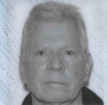 My latest mug shot courtesy of the DMV.