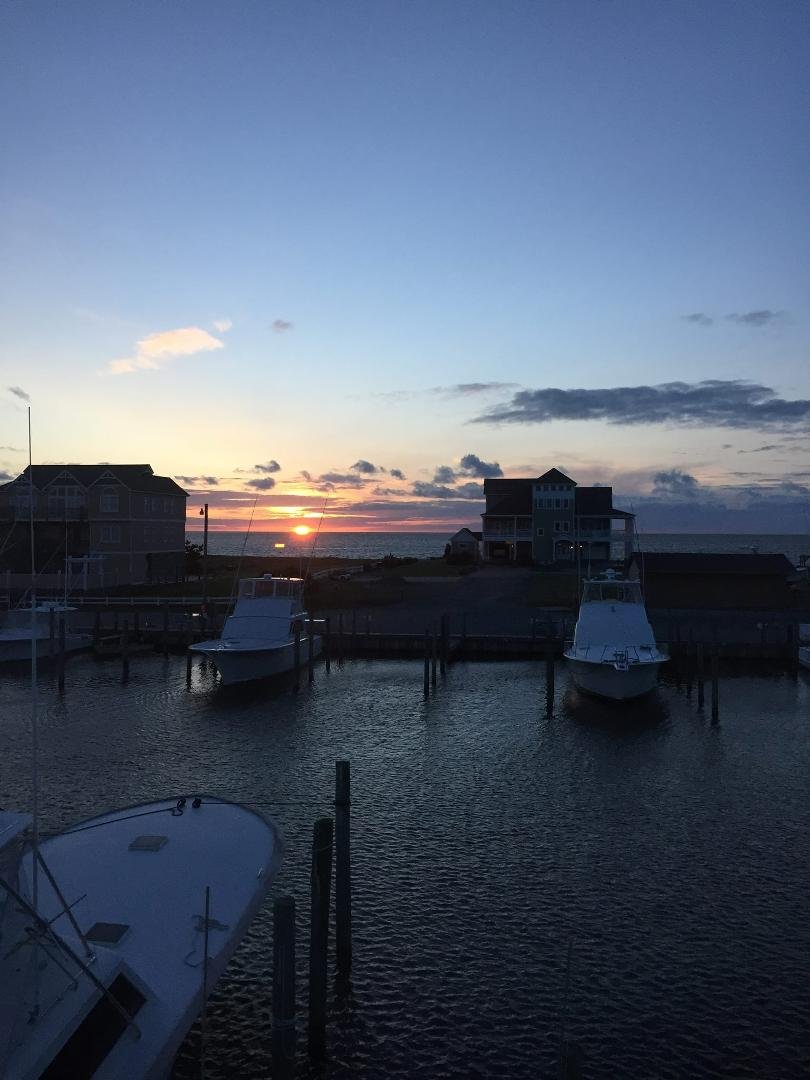 Having dinner with family and watching a beautiful sunset