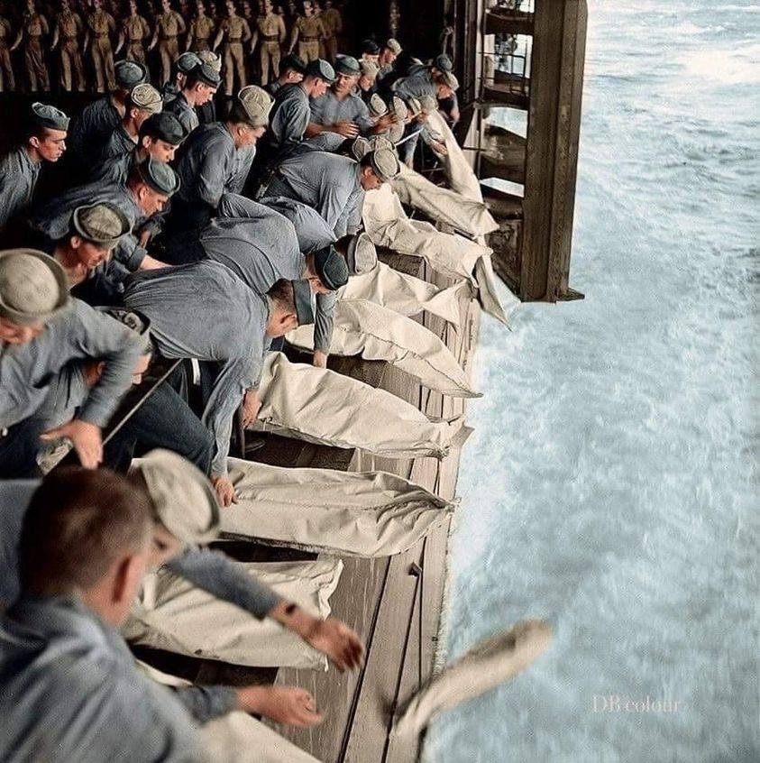 NEVER FORGET
"This is a mass burial at sea, on the USS Intrepid in 1944 following a kamikaze attack. I've never seen this photo, and I figure most of you probably haven't either. I posted so people can see, and remember the