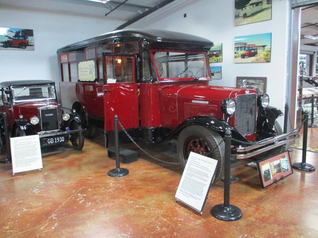 One of the first Motor Homes sitting next to a Morris Minor.