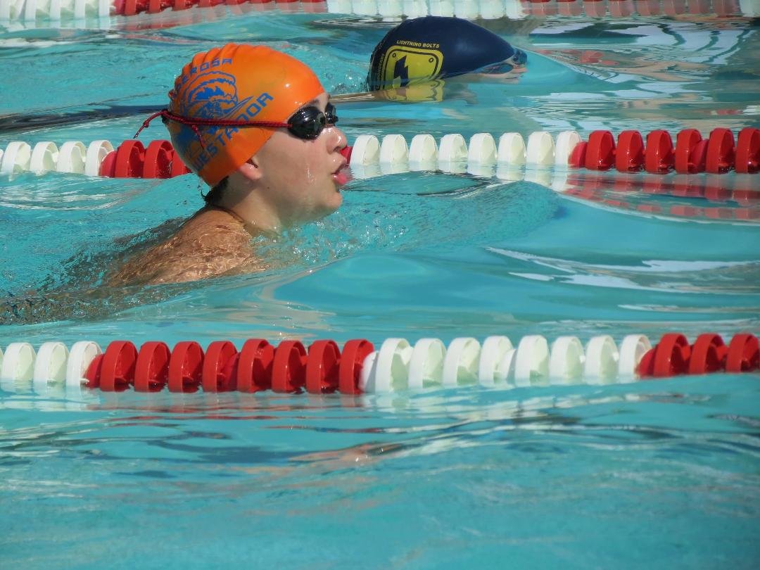 A very close swim meet today, but the mighty Piranhas fell to a determined team, the Lightningbolts, by only 1 point. Everyone was so disappointed, however, there was good that came out of the meet. Connor walked away wit