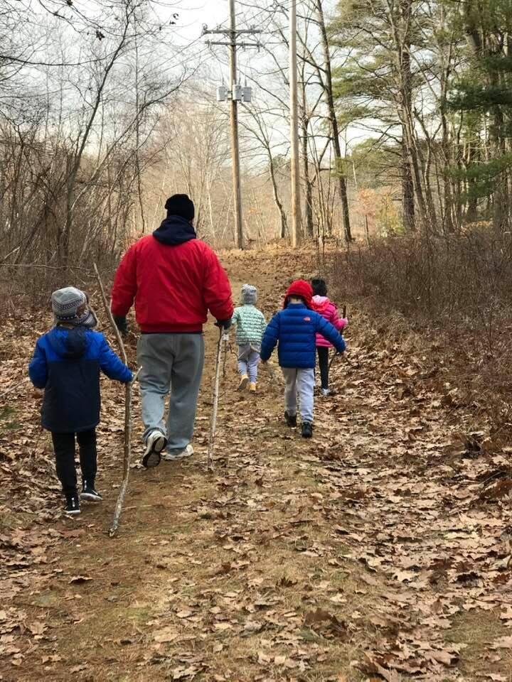 Me and the grandkids on a hike with our walking sticks 😍