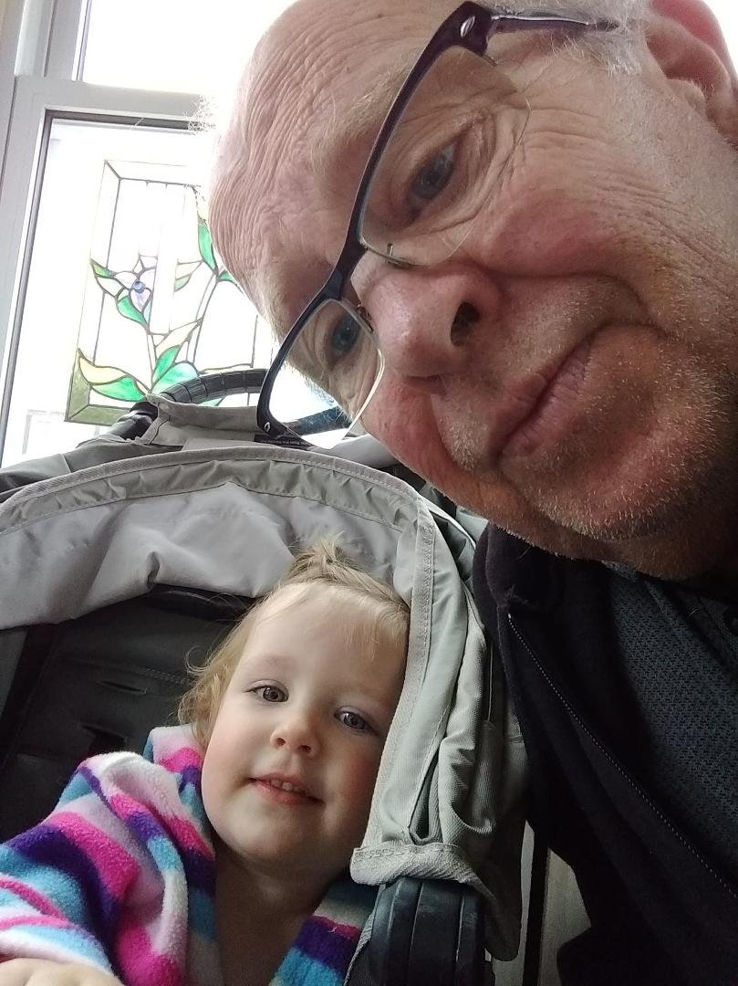 Hailey and grandpa hanging out.