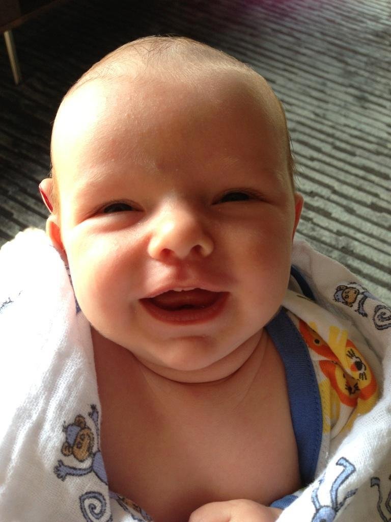 18 days old and Jack's smiling already!  Sooooo smart ;-)
