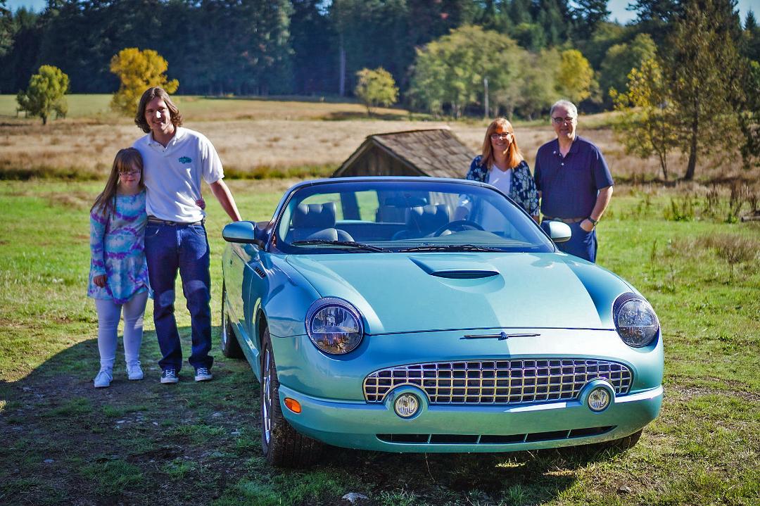 A family photo from Fall 2021 with our new "old car,” a legacy from Grandma Pat.
