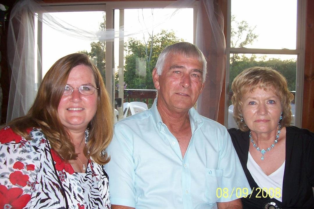 My sister Peggy Summitt Lloyd and brother Charles Summitt and me and my niece Staci Roark Waldridge's wedding reception. Really miss my brother.
