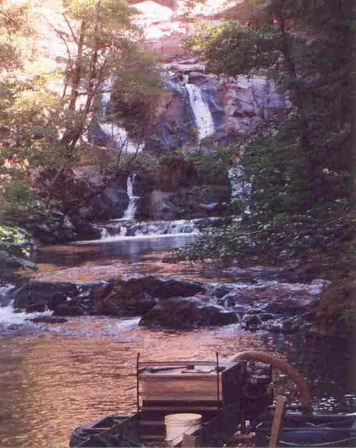 Cape Horn on the Lion's Den Mining Claim using a six inch dredge. There were a total of 6 waterfalls in this area. We had to hump a 12' steel ladder into the middle of nowhere so I could get into the hole under a 15' water