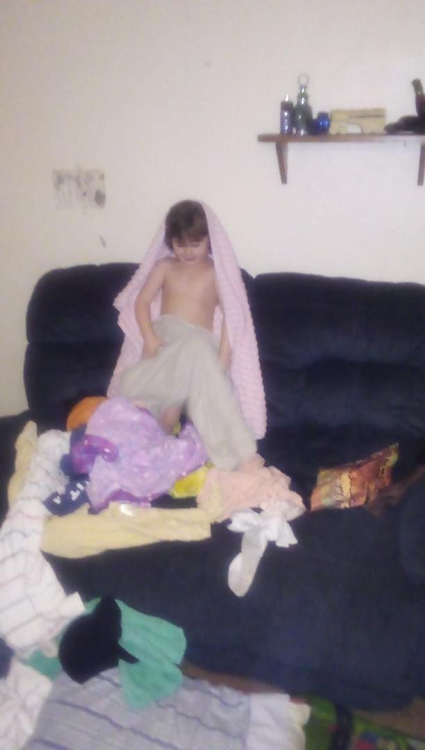 Wesley helping me fold clothes