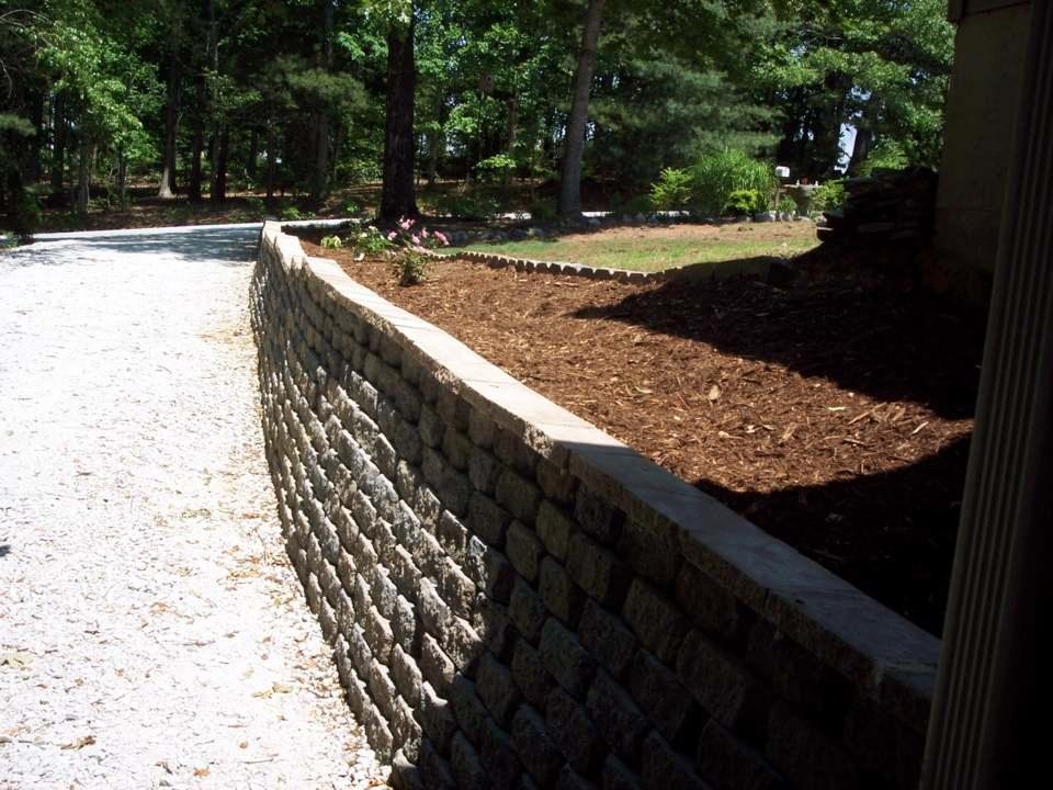 Put up retaining wall after driveway put in.