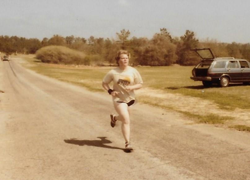 This is a picture of Gina finishing a 10k that she ran at Fort Rucker, AL in 1981.