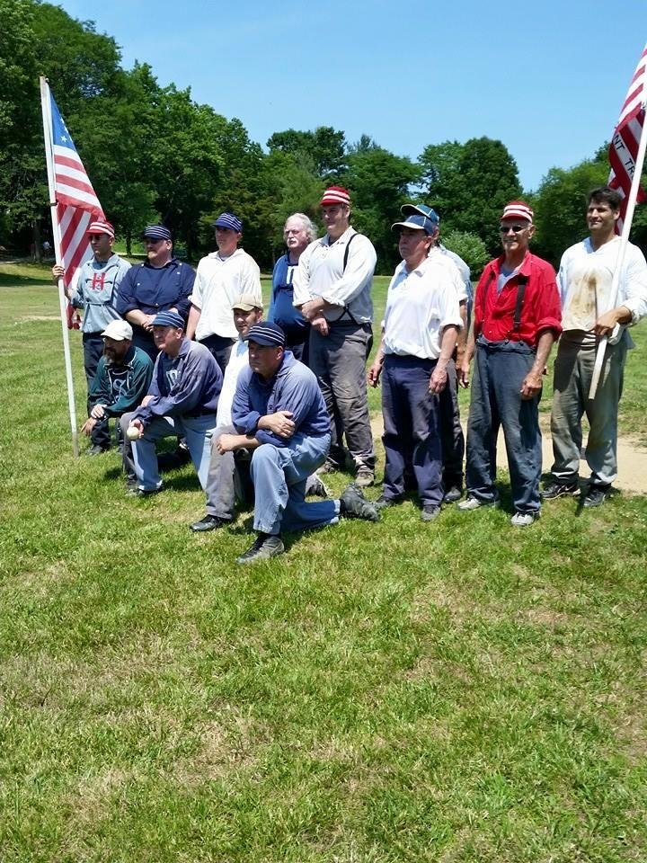 Just finished an exhibition game of Old Time Baseball at Old Bethpage Restoration Village..with wooden bats and no gloves! I survived so I stay on the team. In case you're wondering..... I'm the young guy in the red shirt.