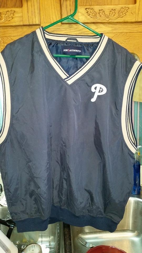 Providence...port authority pullover sleeveless vest. Dark blue trimmed in tan. 100 % polyester. Size XL. 15.00
