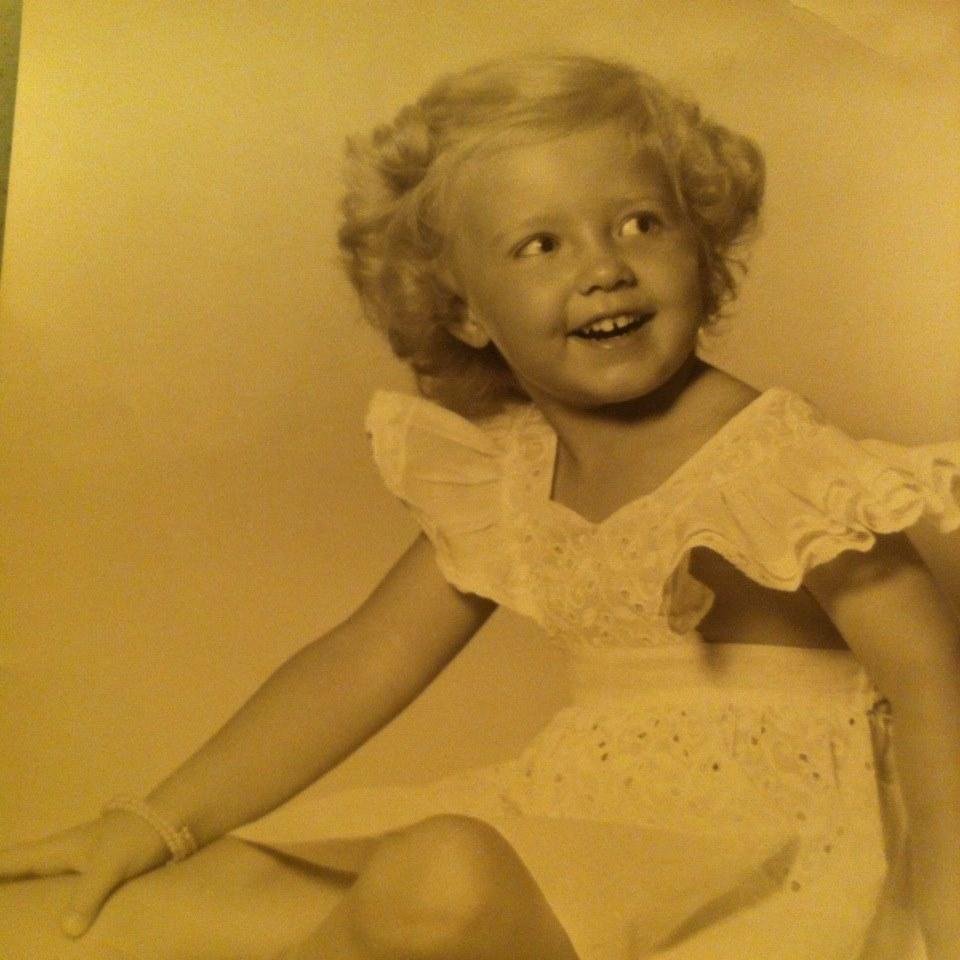 This is me when I was 3 years old. I was already wearing a bracelet. I had blonde hair and green eyes.