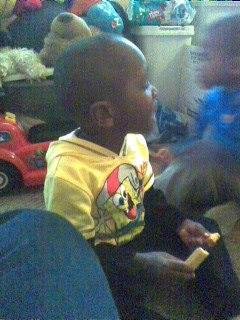 HERE HE IS SITTING LOOKING AT SOMETHING IN ANOTHER DIRECTION!