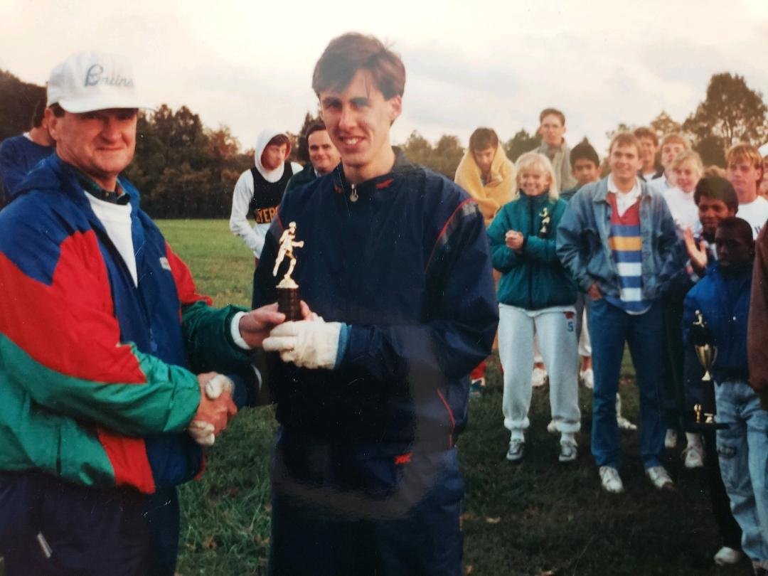 Arthur Kirkland receiving winning trophy