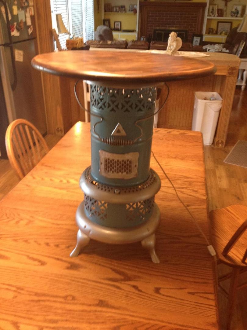My second project complete, old kerosine heater restored with table top and night light.