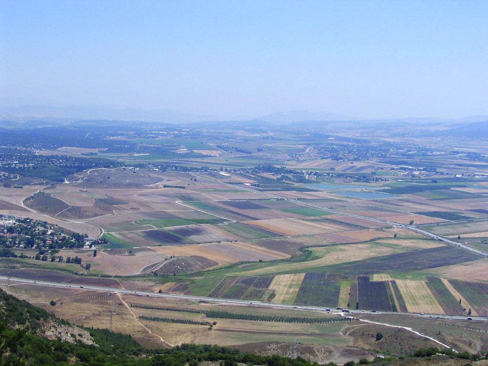 This is the plain of Har Megiddo in Israel, a.k.a. Armageddon, a.k.a. the Jezreel Valley. See Revelation 16:16. I took this picture as I stood on this mountain and looked out over this plain on my visit to Israel.