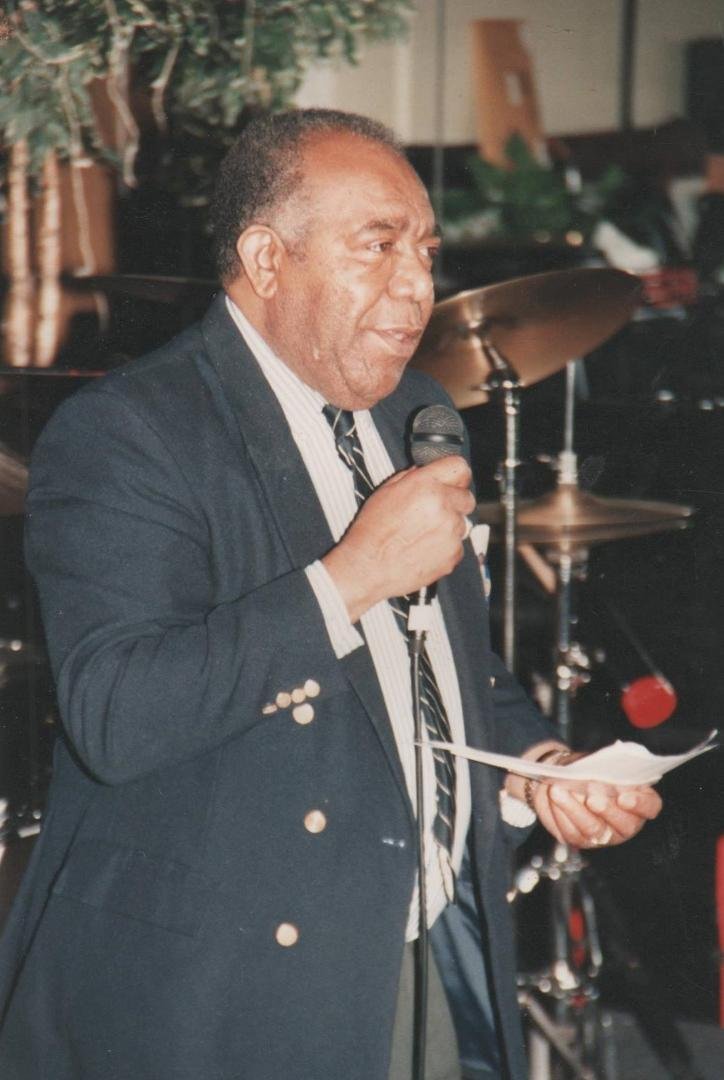 My dad in his element behind the mic.