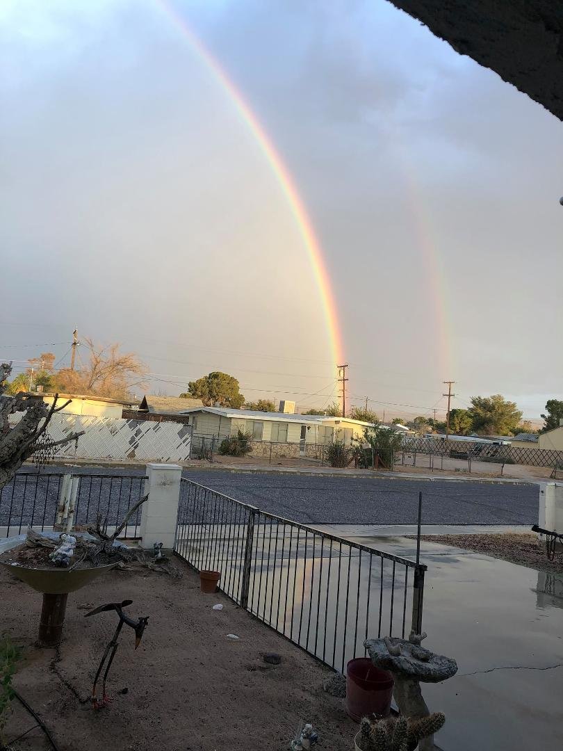 Just took this picture of a double rainbow...it’s beautiful...That’s here’s in Ridgecrest, California...