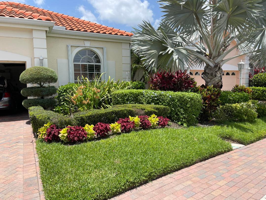 Front of our house, 134 Coral Cay Dr, PBG, July 24, 2023