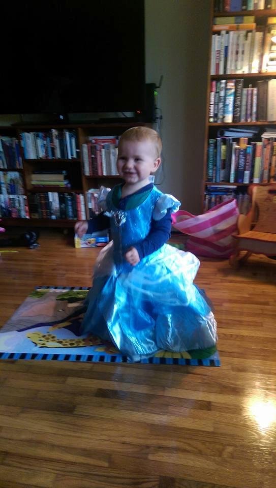 Jack had to try on Lily's new Cinderella dress.