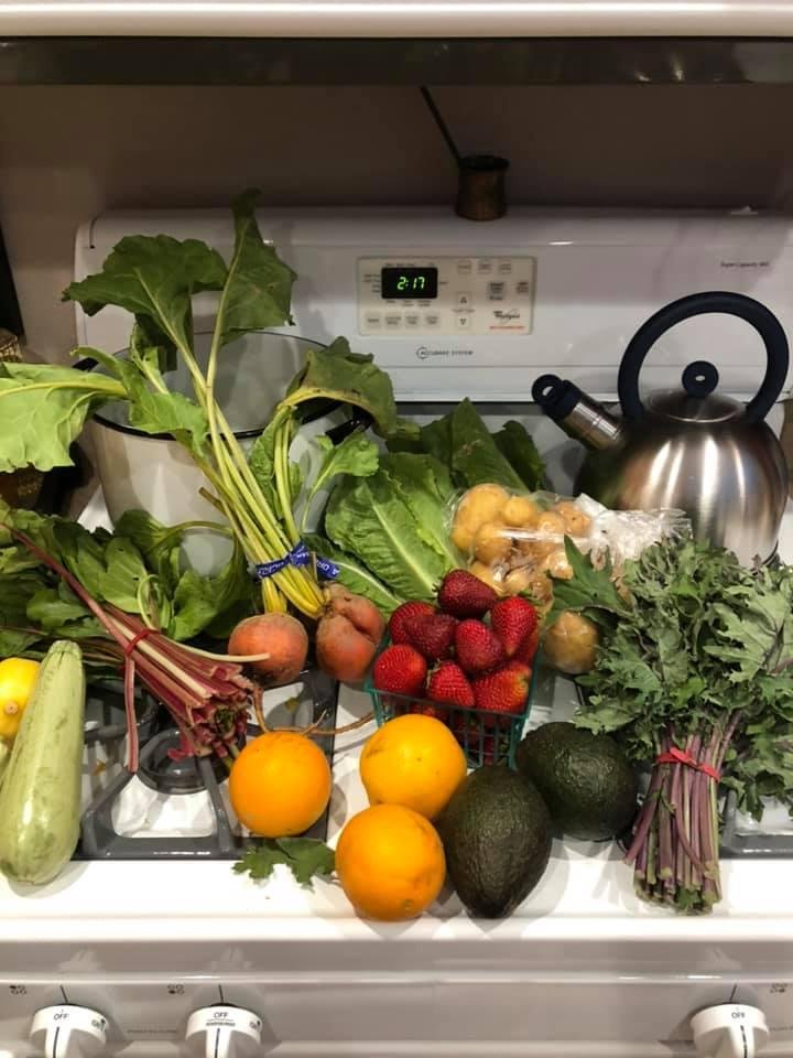 Today’s bounty from the farmers market - kale, chard, romaine, summer squash, butterball potatoes, golden beets, avocados, oranges and strawberries!