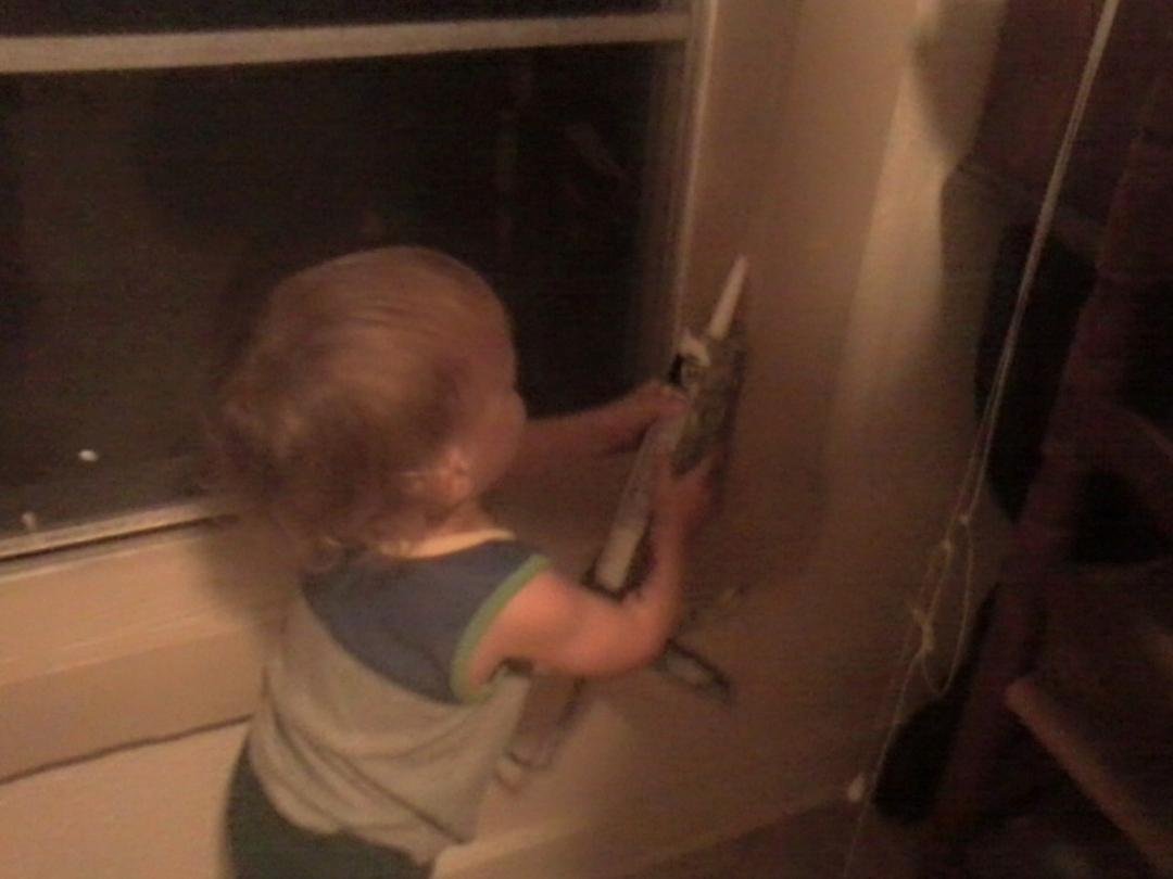 Our grandson, Levi, helping his papa chaulking