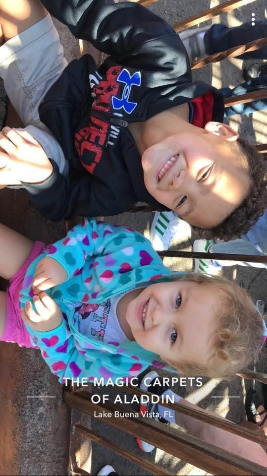 At magic kingdom with my grandchildren 💕
